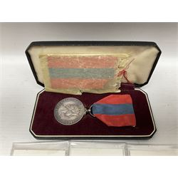 Two Imperial Service Medals to Elsie Hannah Ferguson and Fred Whitehead; each in original case; WWI Special Constabulary Medal to Inspr. Alfred W. Thompson; modern Prisoner of War Medal; cased; replica Victoria Cross and India Mutiny Medals with archive of information relating to Pte. Robert Newell V.C. 9th Lancers; replica Victoria Cross and George Cross with miniatures; and other replica medals etc