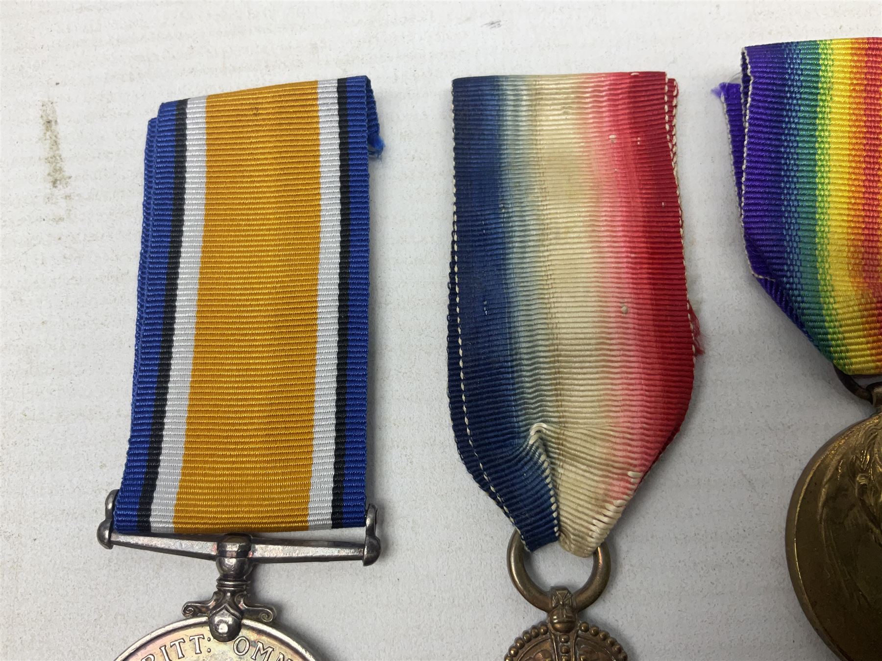Five WW1 Lincolnshire Regiment medals comprising 1914-15 Star awarded to 12032 Pte. H. Pask; 1914-15 Star to 10759 Pte. W. Clark; British War Medal to 7739 A. Sjt. G.W.L. Atkin; Victory Medal to 22678 Cpl. H. Vallance; all with ribbons; and Victory Medal to 6014 Pte. W.S. Boulton; some biographical details (5)