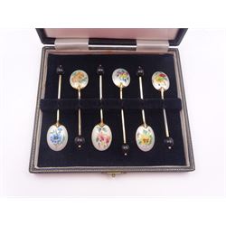 Set of six modern silver-gilt coffee bean spoons, each with enamel floral design to underside of bowls, hallmarked Turner & Simpson Ltd, Birmingham 1960 & 1961, in fitted velvet and silk lined case 