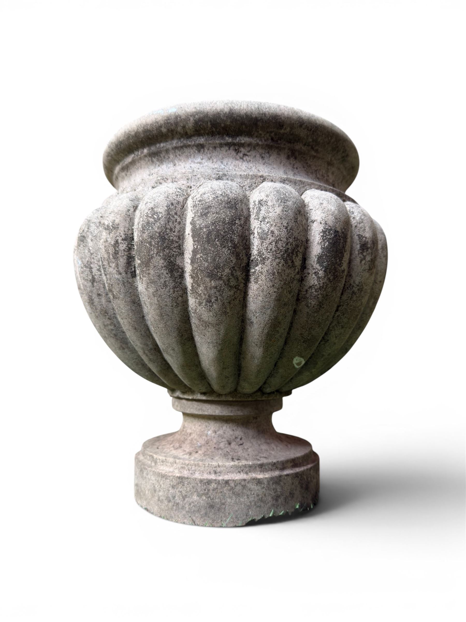 Small marble campana pedestal urn, fluted lobes raised on circular pedestal foot