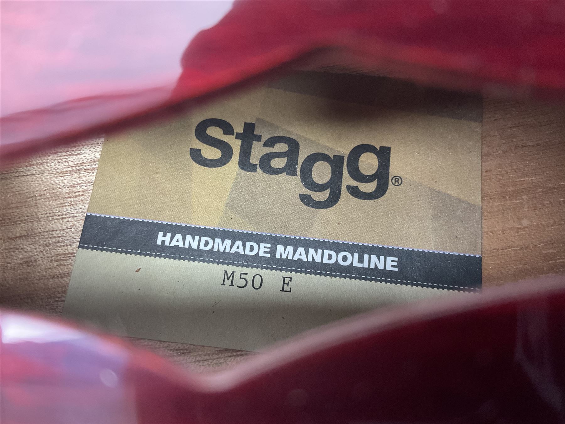 Stagg Model M50 E eight-string electro-acoustic mandolin; bears makers label L69cm; in cardboard delivery box with lead