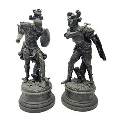 Pair spelter warriors, both with shields with a naturalistic ground and a plinth with relief decoration, H51cm