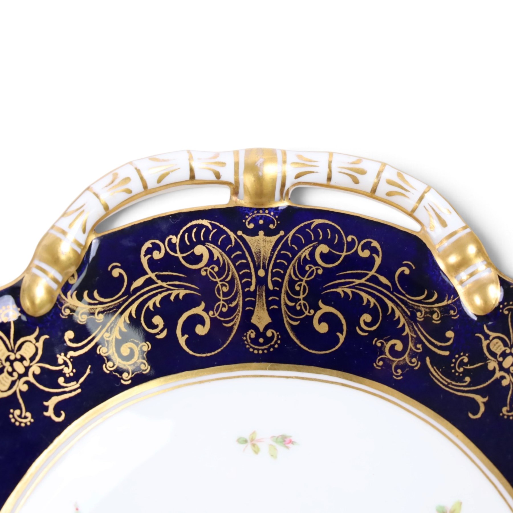 Coalport set of ten plates and four serving plates, each decorated with floral sprigs within a cobalt blue boarder with gilt detail, plates D22cm