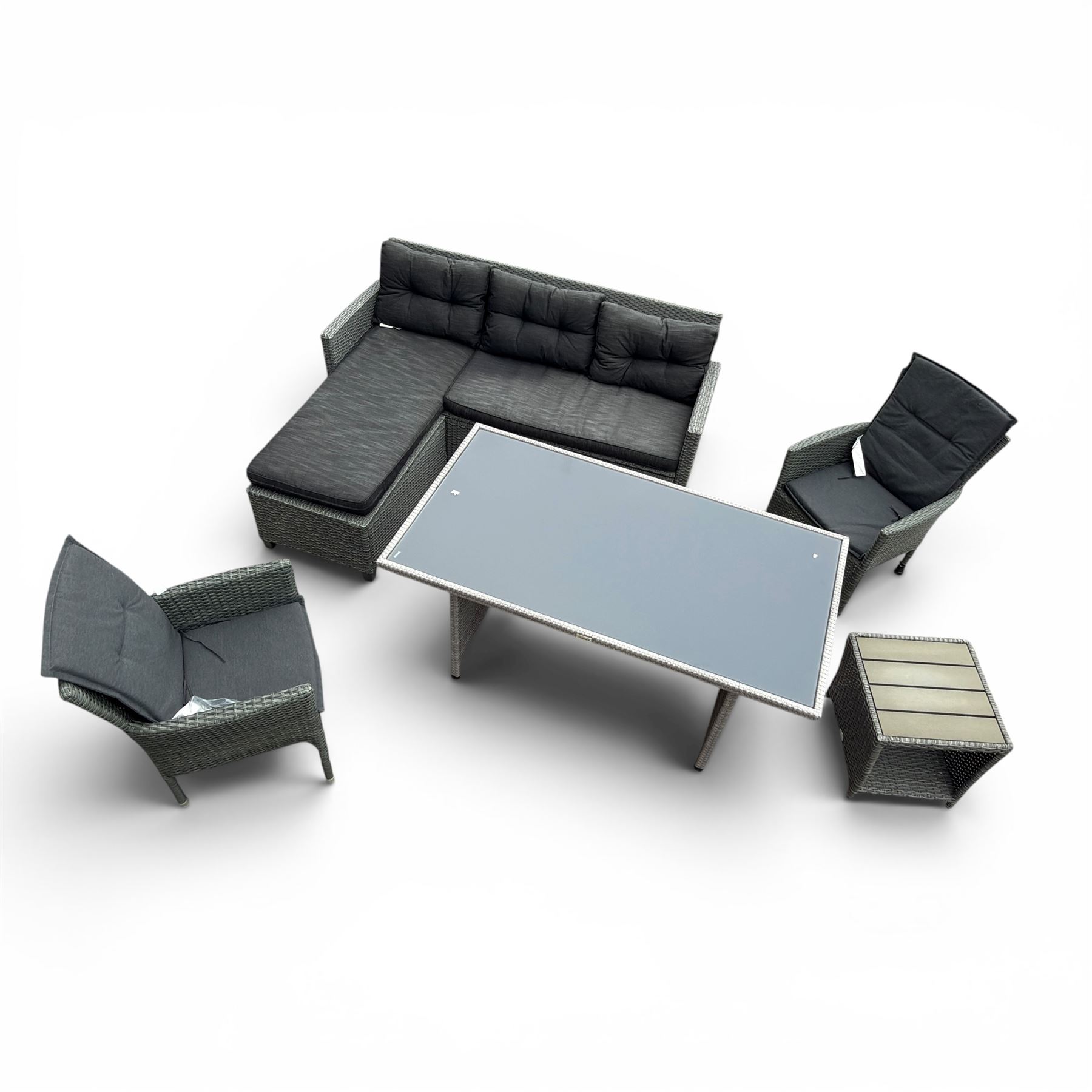 Jutlandia - Rattan garden furniture set with cushions, corner sofa, rectangular glass top table, side table, and two armchairs