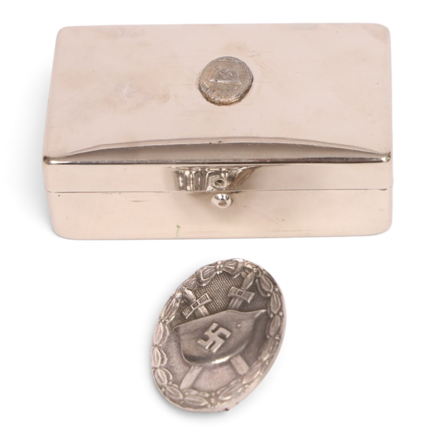WWII German Third Reich 'silver' wound badge, numbered verso L22, together with a silver plate box with a miniature wound badge to the hinged lid, with brown velvet lining, box H3cm 