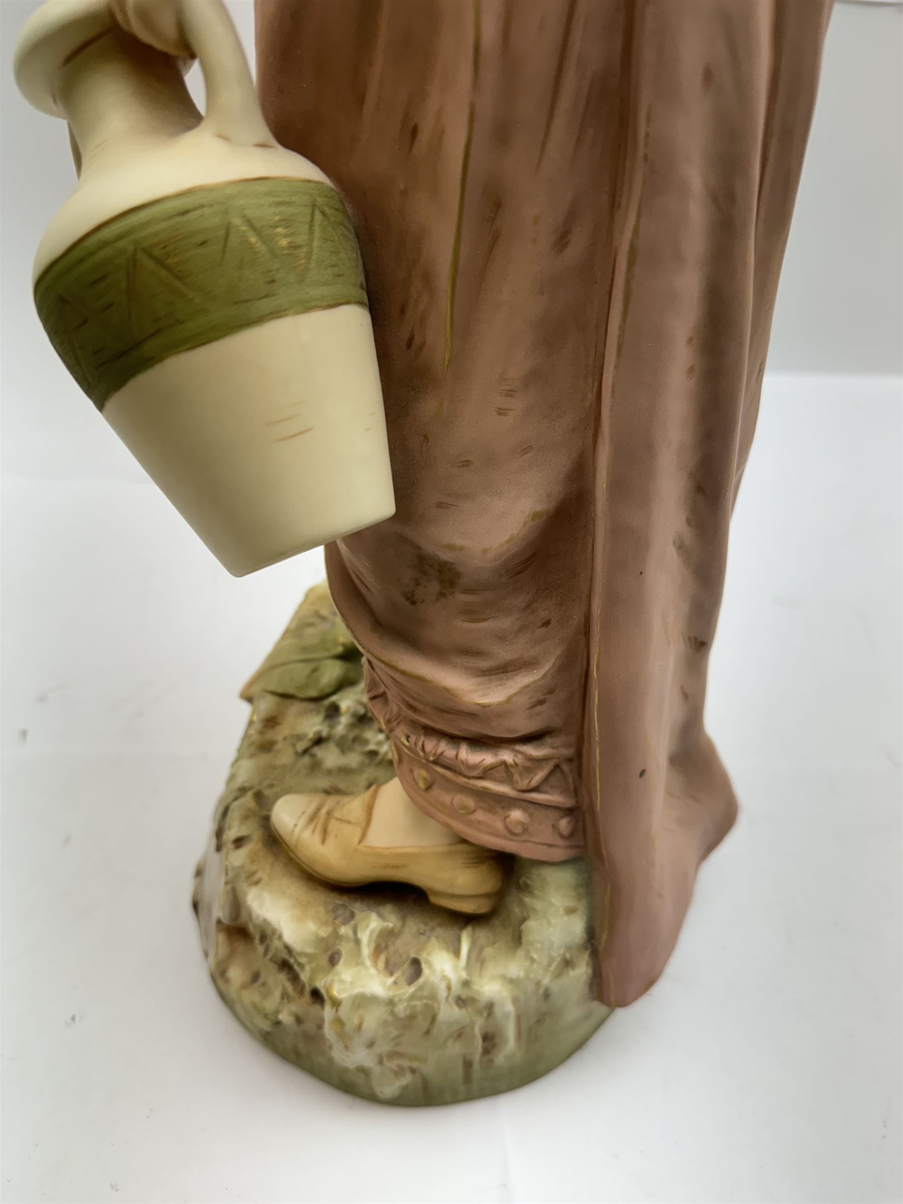 Royal Dux figure no. 686, modelled as a female water carrier, carrying two urns and wearing flowing green and pink robes, with applied pink triangle mark beneath, H61cm