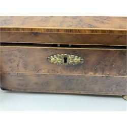 19th century burr yew wood tea caddy, of sarcophagus form, with strung details and brass mounts, the interior split into three compartments, upon four brass bun feet, together with an oak and brass bound writing slope, with red leather interior with gilt detailing, largest H16cm, W40cm