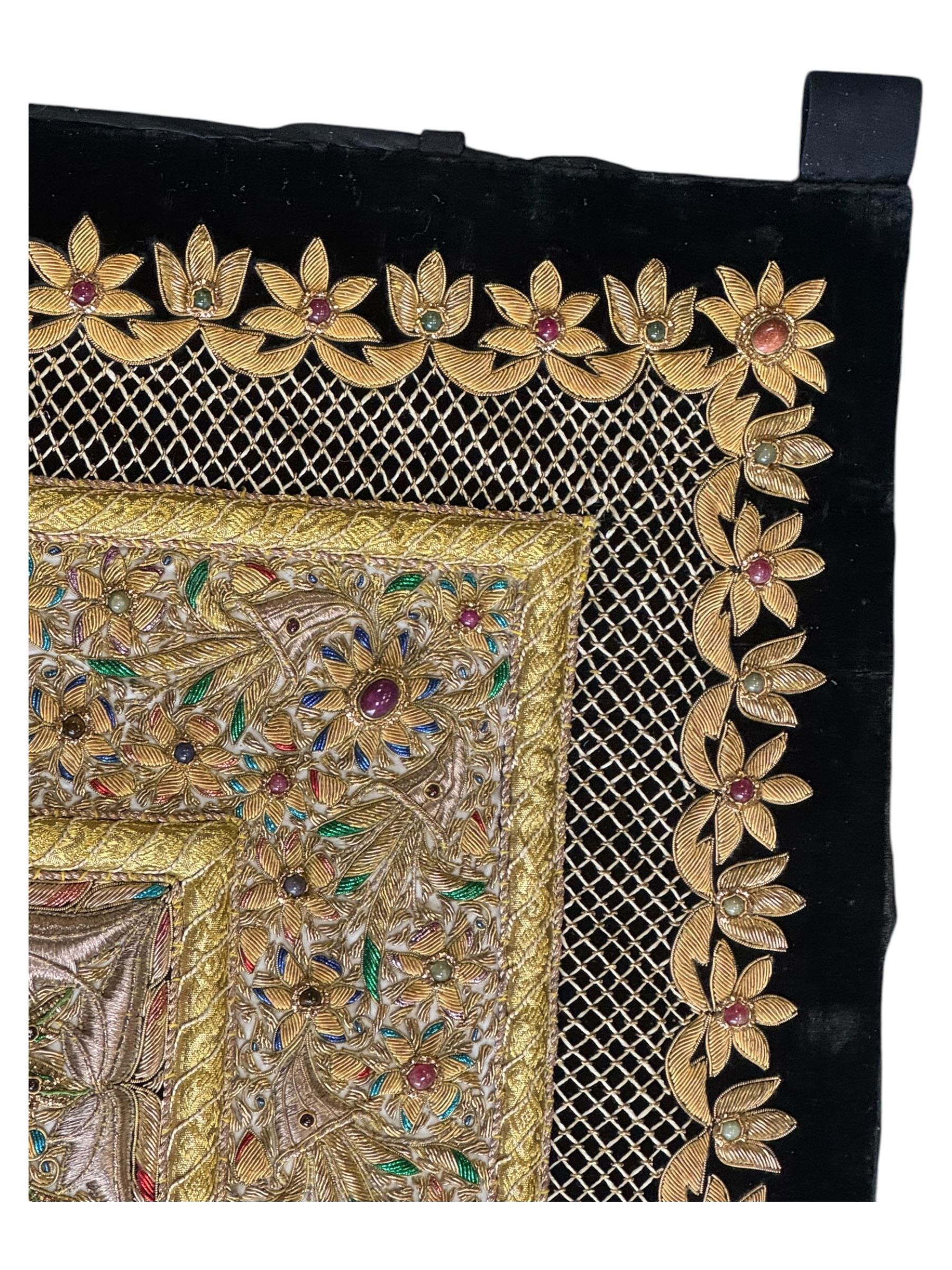 20th century large Zardozi wall hanging, hand embroidered in gold thread on black velvet ground with semi-precious stones and central medallion  149x93cm
