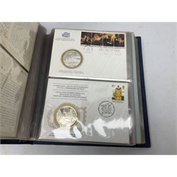 Thirty-six 'International Society of Postmasters Official Commemorative Issues' sterling silver proof medallic covers dating from 1975 to1977, housed in the official folder