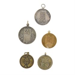 Collection of Japanese WWI and WWII badges and medals, including veteran badges 