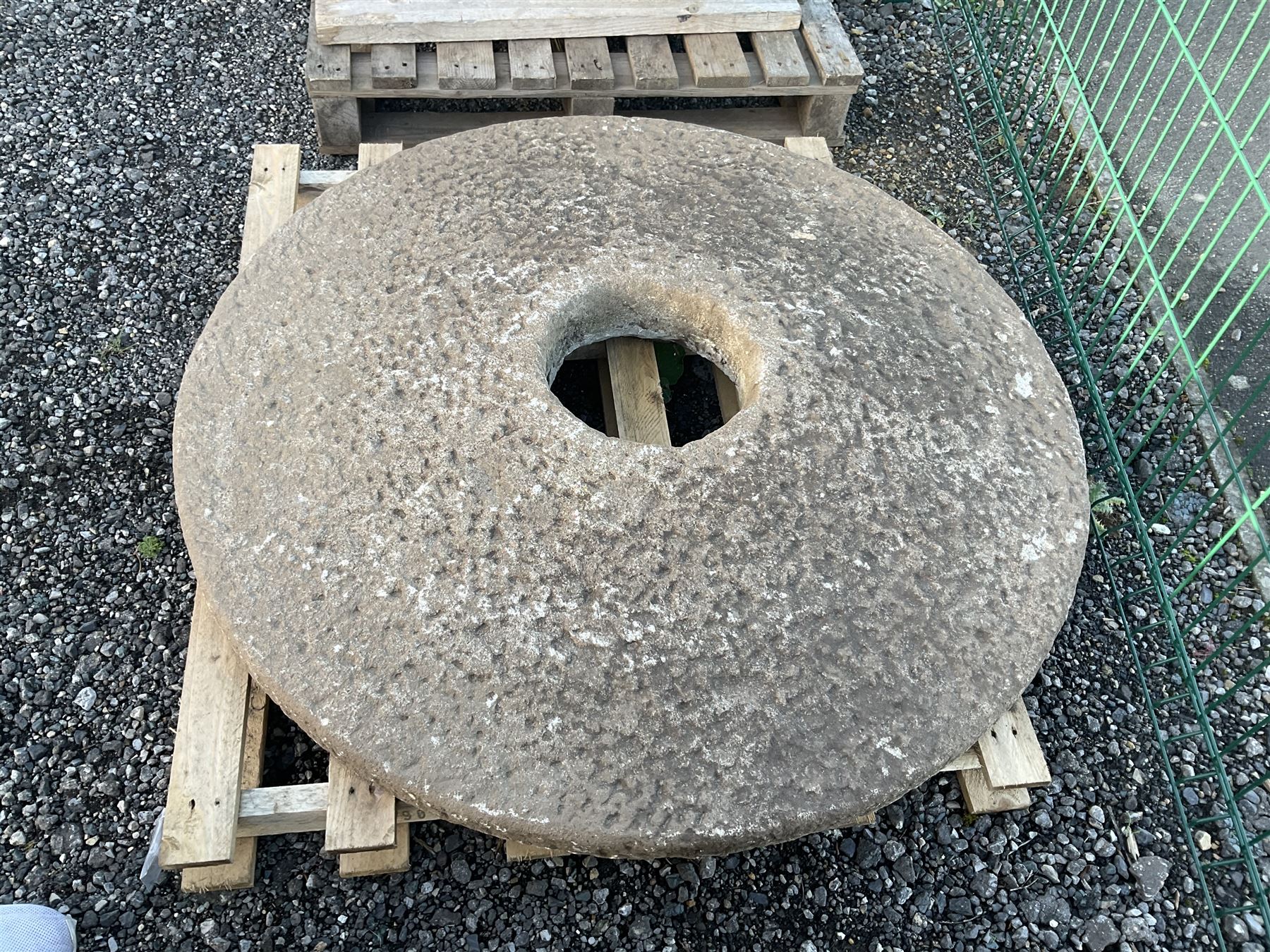 19th century circular mill stone, dome shaped - THIS LOT IS TO BE COLLECTED BY APPOINTMENT FROM DUGGLEBY STORAGE, GREAT HILL, EASTFIELD, SCARBOROUGH, YO11 3TX