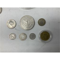 Coins including United States of America 1885 Morgan dollar, Queen Elizabeth II Bailiwick of Guernsey 20012 and 2013 five pound coins, Isle of Man Paddington Bear 2008 one crown, various other commemorative coins etc