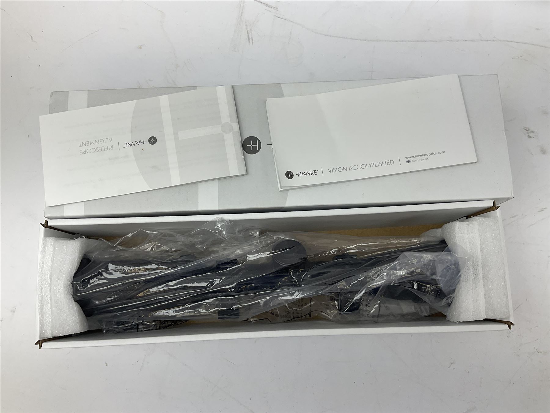Hatsan .22 break-action air rifle retailed by Edgar brothers with 46cm barrel including fully integrated sound moderator, No.092031501; L113cm overall; in gun sleeve; together with Hawke Vantage 2-7x32 telescopic sight, Bressler Condor 24-72x100 spotting scope with carrying case and Velbon EF-61 tripod; all boxed (4)
