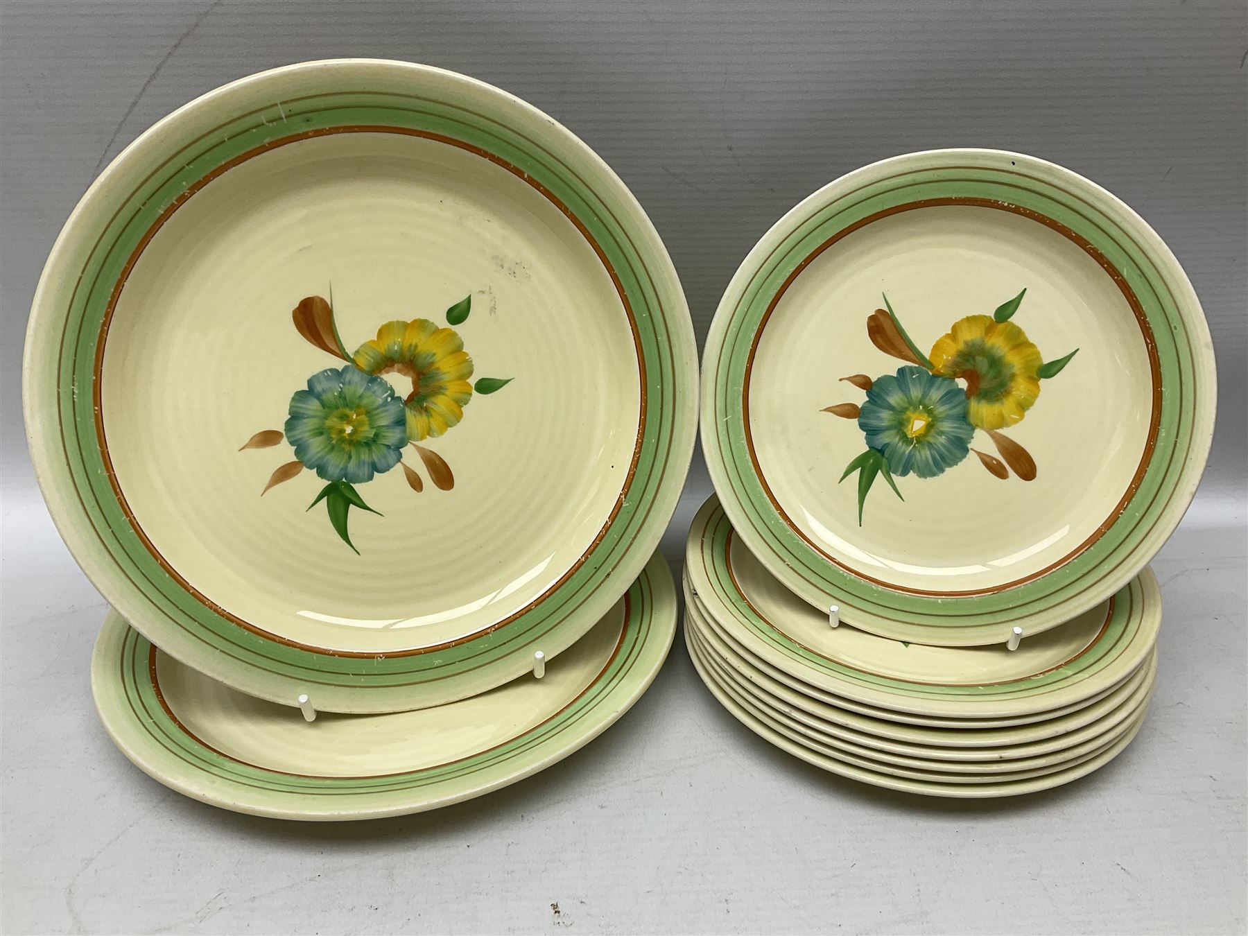 Wilkinson Clarice Cliff honeydew pattern tea service for eight, comprising teapot, milk jug, open sucrier, teacup and saucers, dessert plates and two side plates (29)