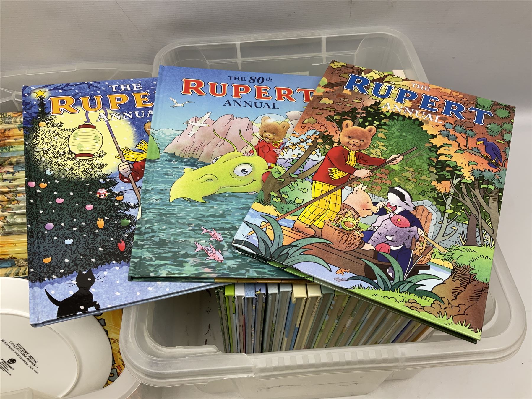 Sixty-eight Rupert Bear Annuals; almost complete run 1954 - 2016, lacking 1960/73/74; some duplicates/triplicates; together with a Wedgwood Rupert Bear Collector's plate (69)