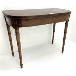 19th century mahogany tea table with fold-over top, turned tapering supports 
