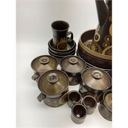 Denby Arabesque pattern tea and dinner wares, comprising large serving bowl,  five dinner plates, three side plates, four twin handled bowls and covers, one bowl and cover, four bowls, salt and pepper shaker, pan with lid, six egg cups, small serving dish, coffee pot, water jug, milk jug, jug with handle,  two sucriers and covers, four tea cups and one coffee