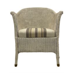 Painted wicker chair with upholstered seat cushion