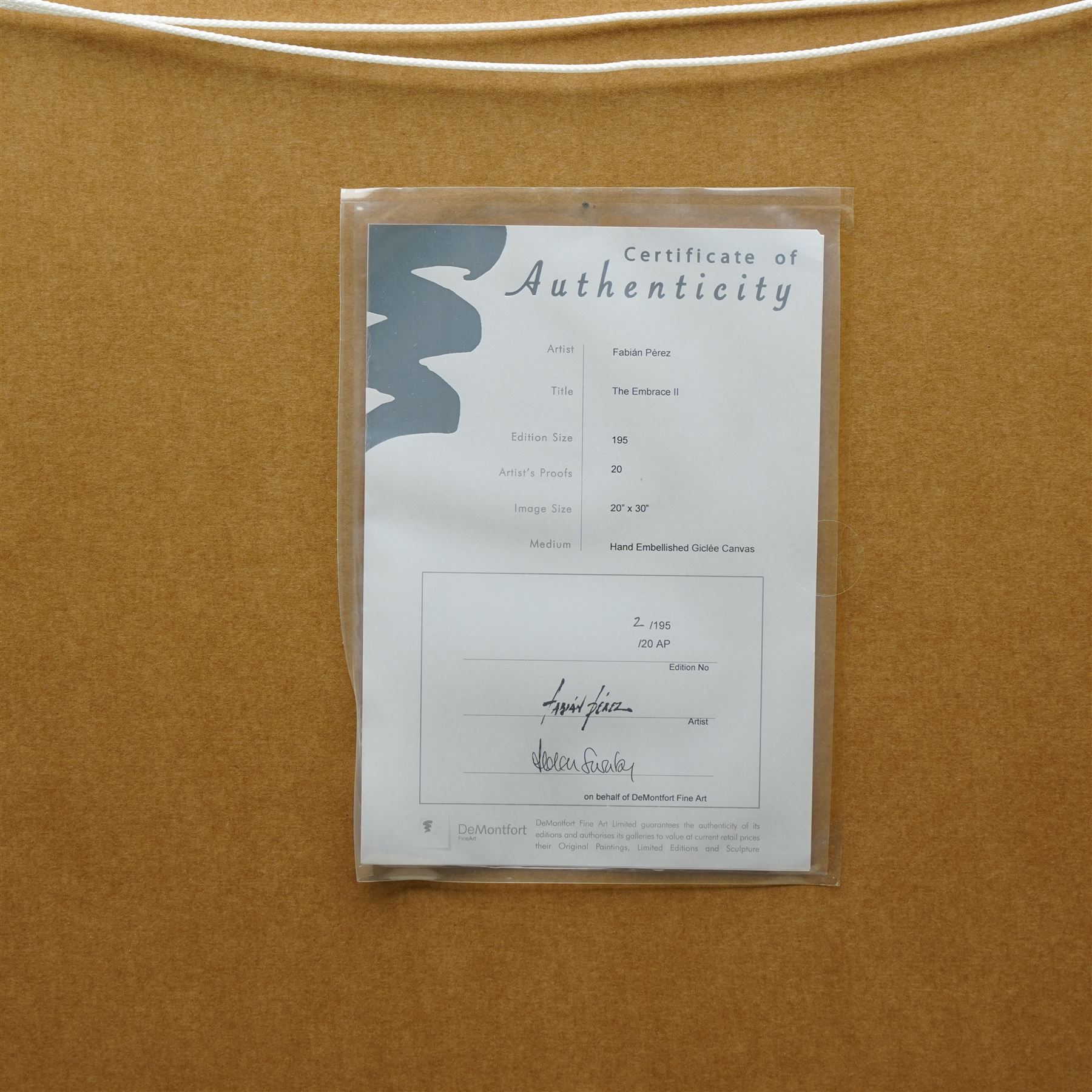 Fabian Perez (Argentina 1967-): 'Embrace II', limited edition hand-embellished giclee print on canvas signed and numbered 2/195, with certificate of authenticity verso 75cm x 50cm