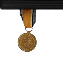 WWI medal trio; Victory medal, 1914/15 star and War medal, framed, together with WWI medal pair; victory and defence medals, awarded to 5832 Pte J Wilson North'O Fus, and WWII Defence Medal, framed