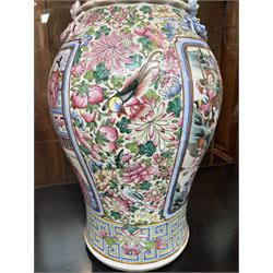 Large pair of 19th century Cantonese famille rose vases, each painted with various courtly scenes, including a display of warriors fighting on horseback before an official and his attendants, double Buddhist lion handles and applied at the shoulders with chilong, the lower band painted with Greek key motif, H58cm (2)