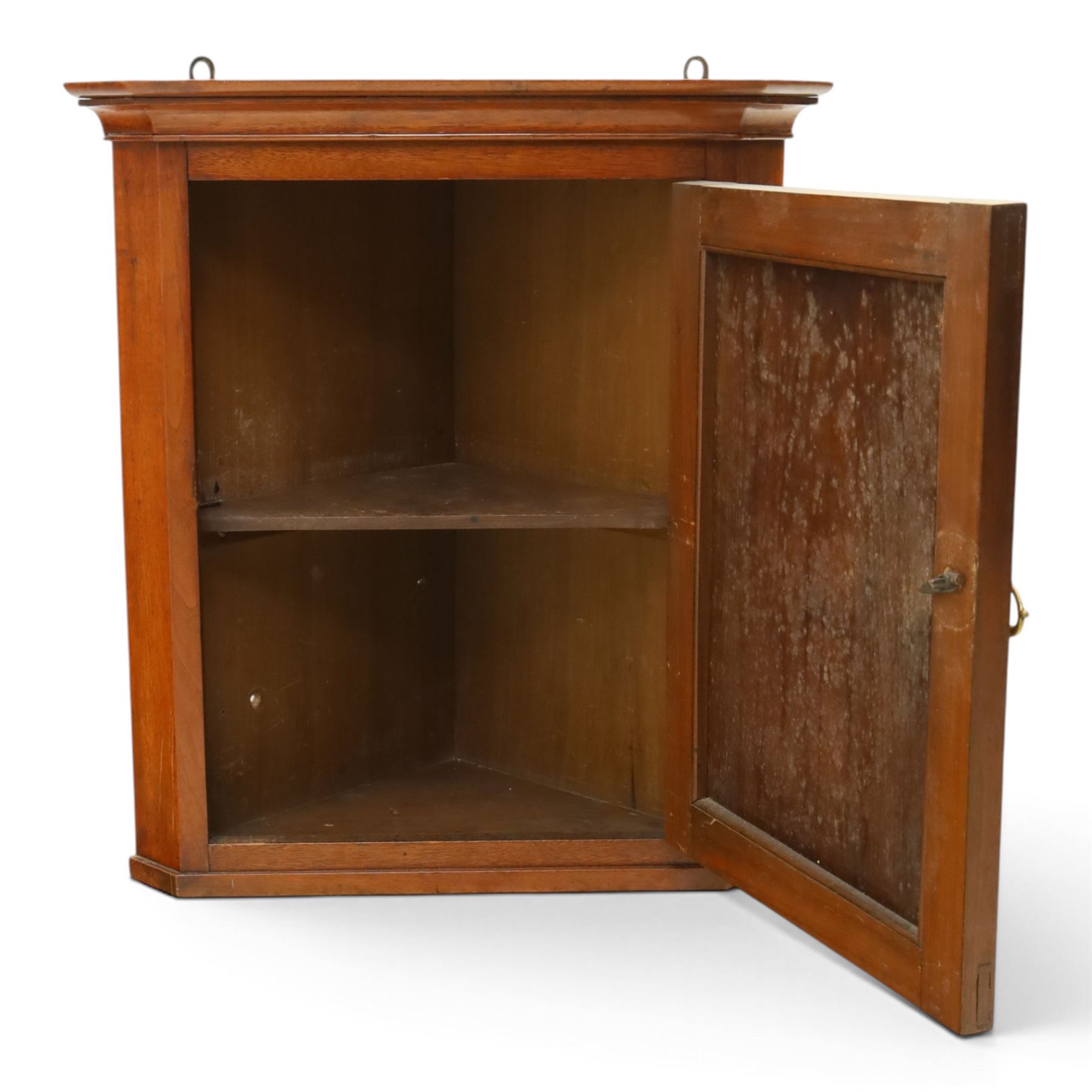 Edwardian walnut hanging corner cabinet, single panelled door with applied carved foliate decoration enclosing shelf 