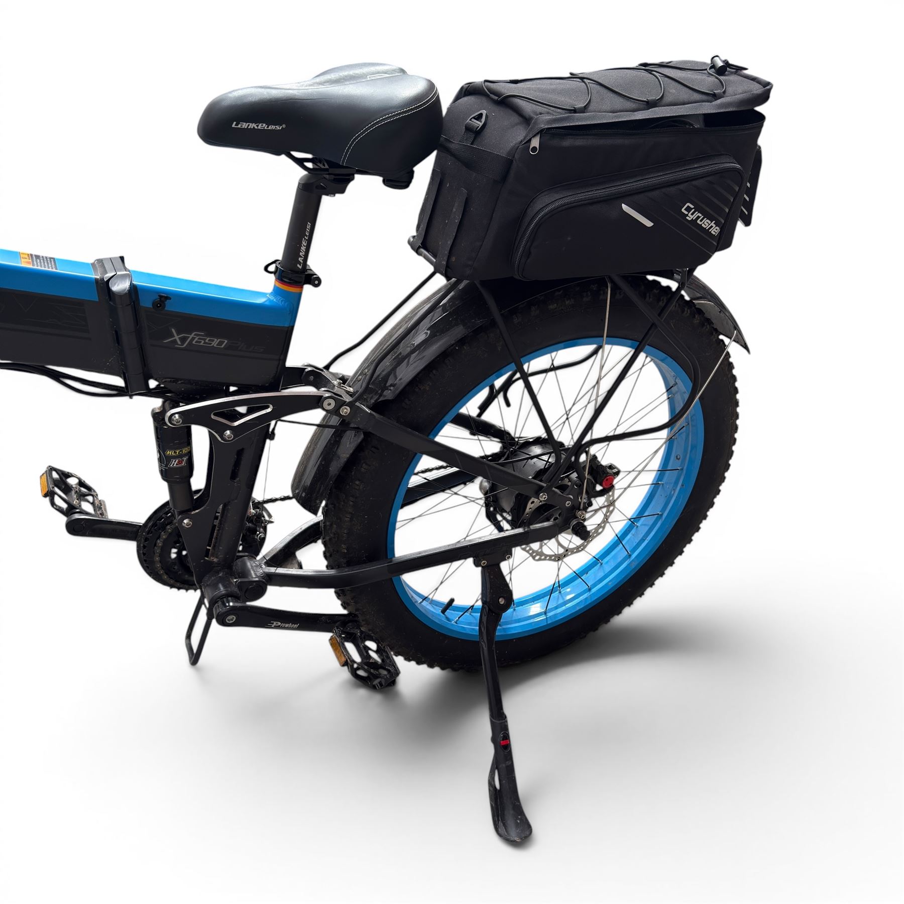 Cyrusher XF690 Plus - electric fat tyre bicycle, 250W model, with suspension forks, disc brakes, rear pannier bag and blue and black finish.
