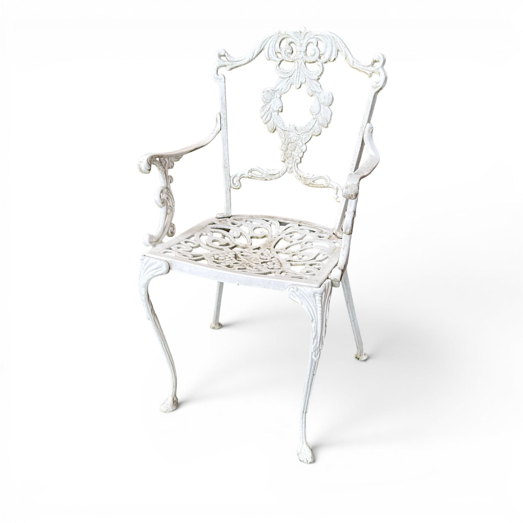 Victorian design cast aluminium circular garden table and four armchairs, ornate grape design in antique white paint