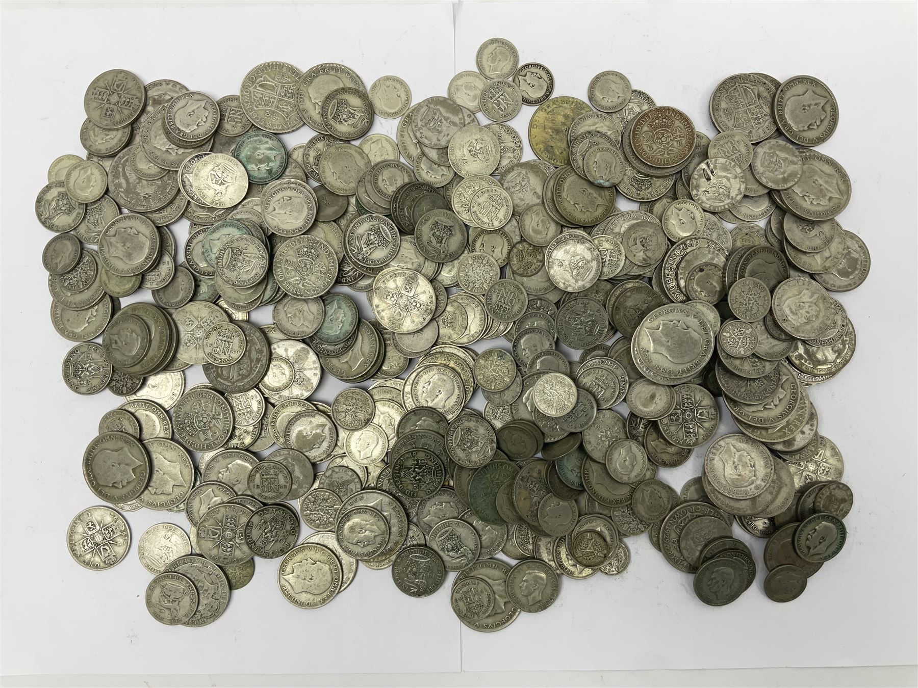 Approximately 2719 grams of Great British pre 1947 silver coins
