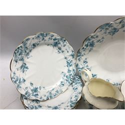 Edwardian David Chapman & Sons tea service for six, of lobed form decorated with blue transfer printed foliate decoration and gilt rims