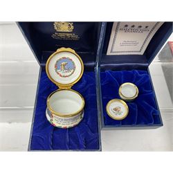 Eight Christmas themed Halcyon Days enamel boxes, and a Halcyon Days enamel bonbonniere modelled as a snowman, each in fitted box 