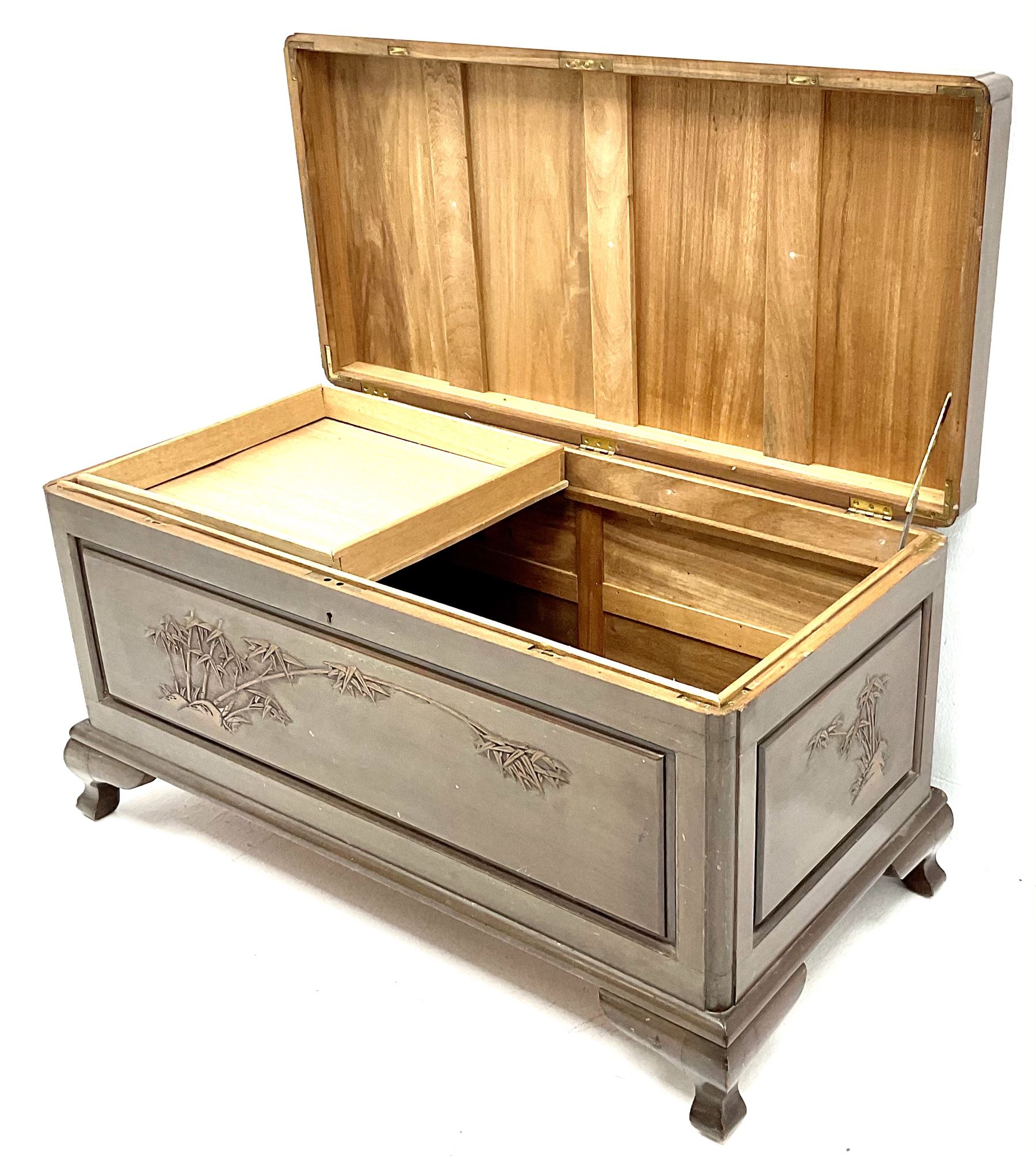 Chinese rosewood camphor wood blanket chest, bamboo carved detail, hinge lid, shaped bracket supports 