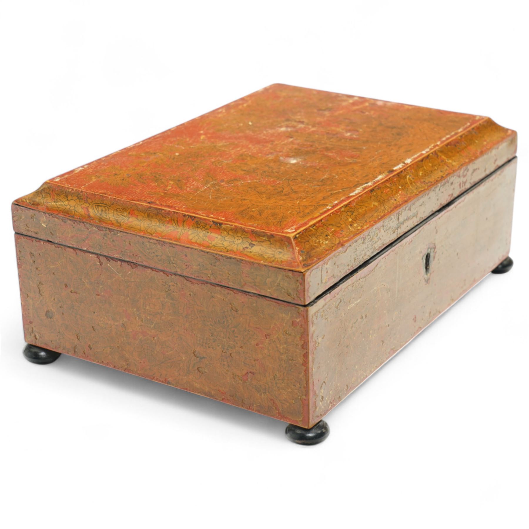 Regency red lacquered penwork box, of rectangular form on bun feet, decorated with classical figures in a landscape among foliate motifs, W28cm 