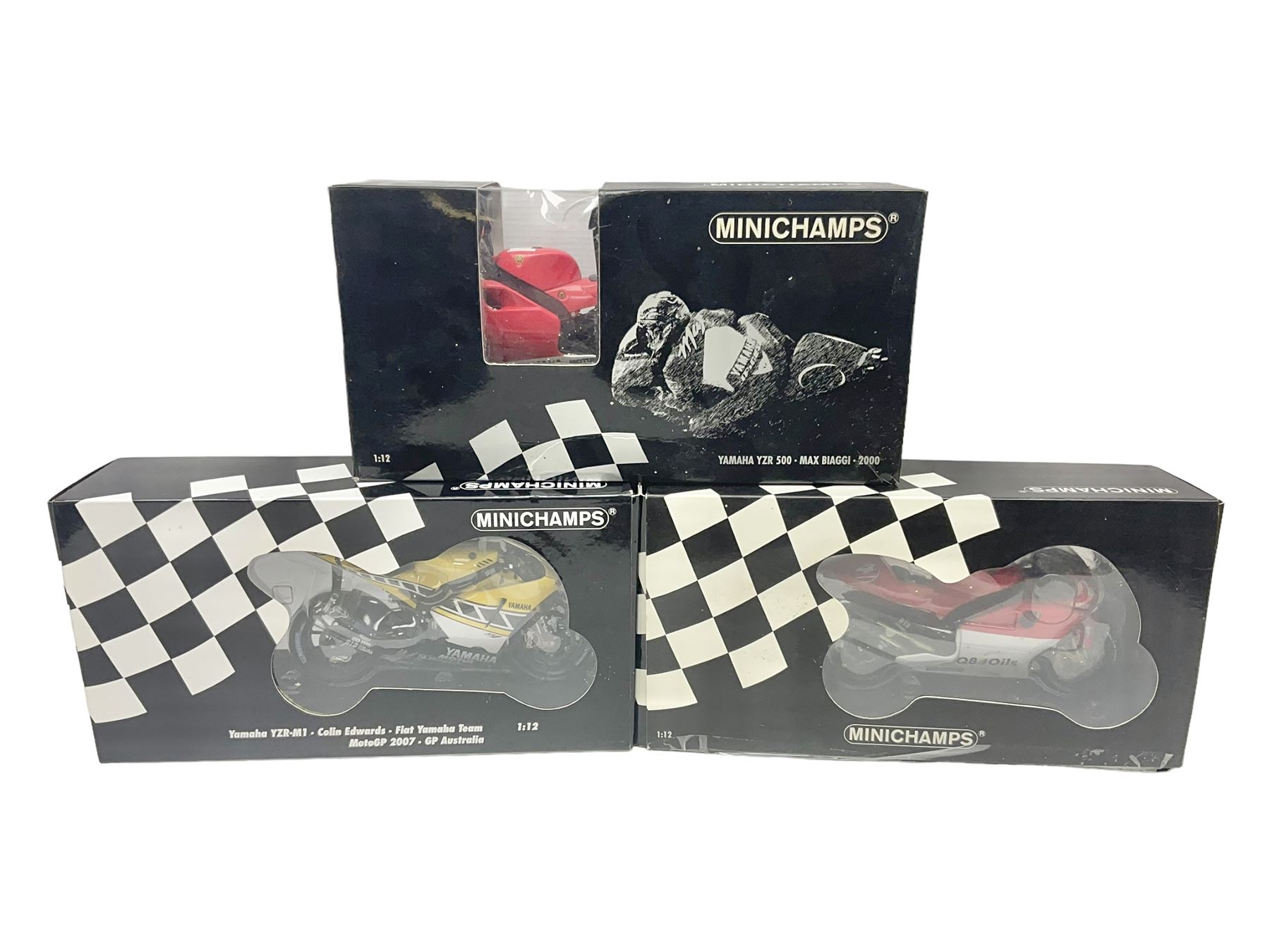 Three Minichamps 1:12 scale die-cast motorcycles - Yamaha YZR 500 Max Biaggi 2000; Yamaha YZR-M1 Colin Edwards Fiat Yamaha Team MotoGP 2007 GP Australia; and Yamaha YZR 500Team Yamaha Max Biaggi 500ccGP 2001; all boxed (3)