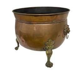Copper and brass coal / log basket with lion's head handles and claw feet