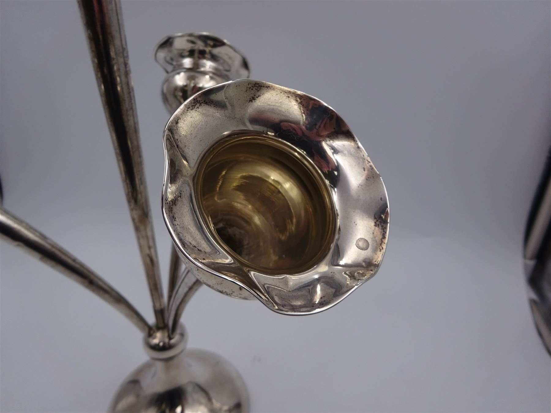 Early 20th century silver epergne, with four fluted branches, upon a weighted domed circular foot, engraved foot with monogram date 1887-1912, hallmarked Colen Hewer Cheshire, Chester 1910, H39.2cm
