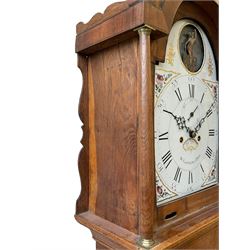 William Gostling of Diss  (Norfolk)-  Late 18th century 8-day oak longcase clock c1780-90, break arch top with scalloped cresting and three brass finials, glazed break arch hood door flanked by turned pilasters with brass capitals, trunk with a long trunk door and rounded top on a square plinth with an applied and shaped skirting, early painted Wilson of Birmingham dial with Roman numerals and five minute Arabic's, matching steel hands and second pointer, arched square ended calendar aperture with date disc behind, floral spandrels within gesso borders and a painted rocking automaton representing Mercury to the break arch, dial pinned via a false plate to a weight driven rack striking movement with a recoil anchor escapement, striking the hours on a cast bell. With pendulum weights and key. 
William Gostling (II) is recorded as working in Diss from 1774 to 1797, succeeded by widow Anne and son George . The dial of this clock is illustrated and discussed in detail in M.F. Tennants book 