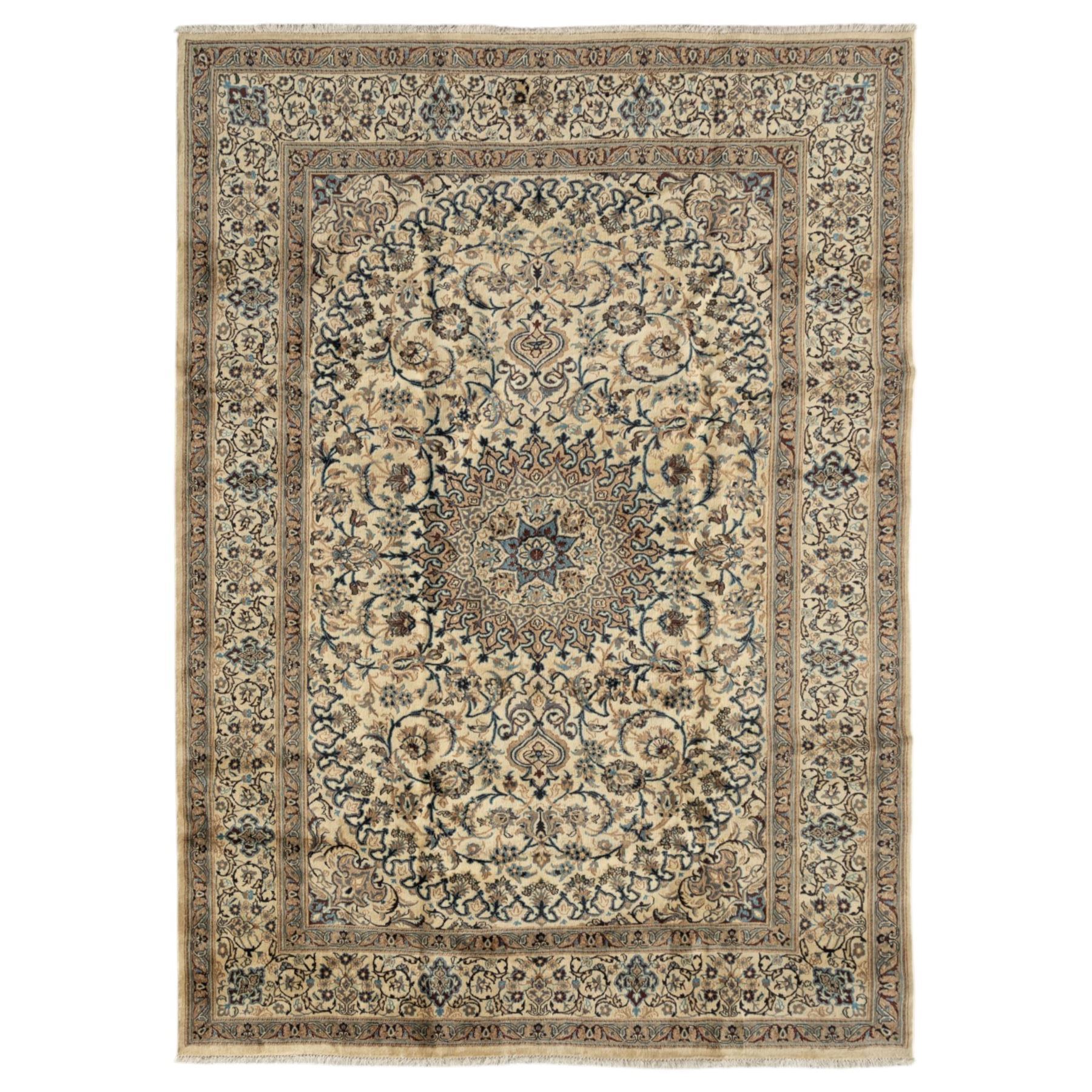 Persian Nain carpet, ivory field with concentric medallion in shades of blue and beige, surrounded by scrolling vines, palmettes and floral sprays, enclosed by multiple borders with intricate foliate motifs, originating from the Nain region of central Iran