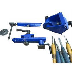 Record wood turning lathe and motor, with a three jaw chuck, tailstock and tool rest, selection of wood turning and woodworking chisels, electric bench grinder with grinding wheel and collet chuck plus a Record bench vice.