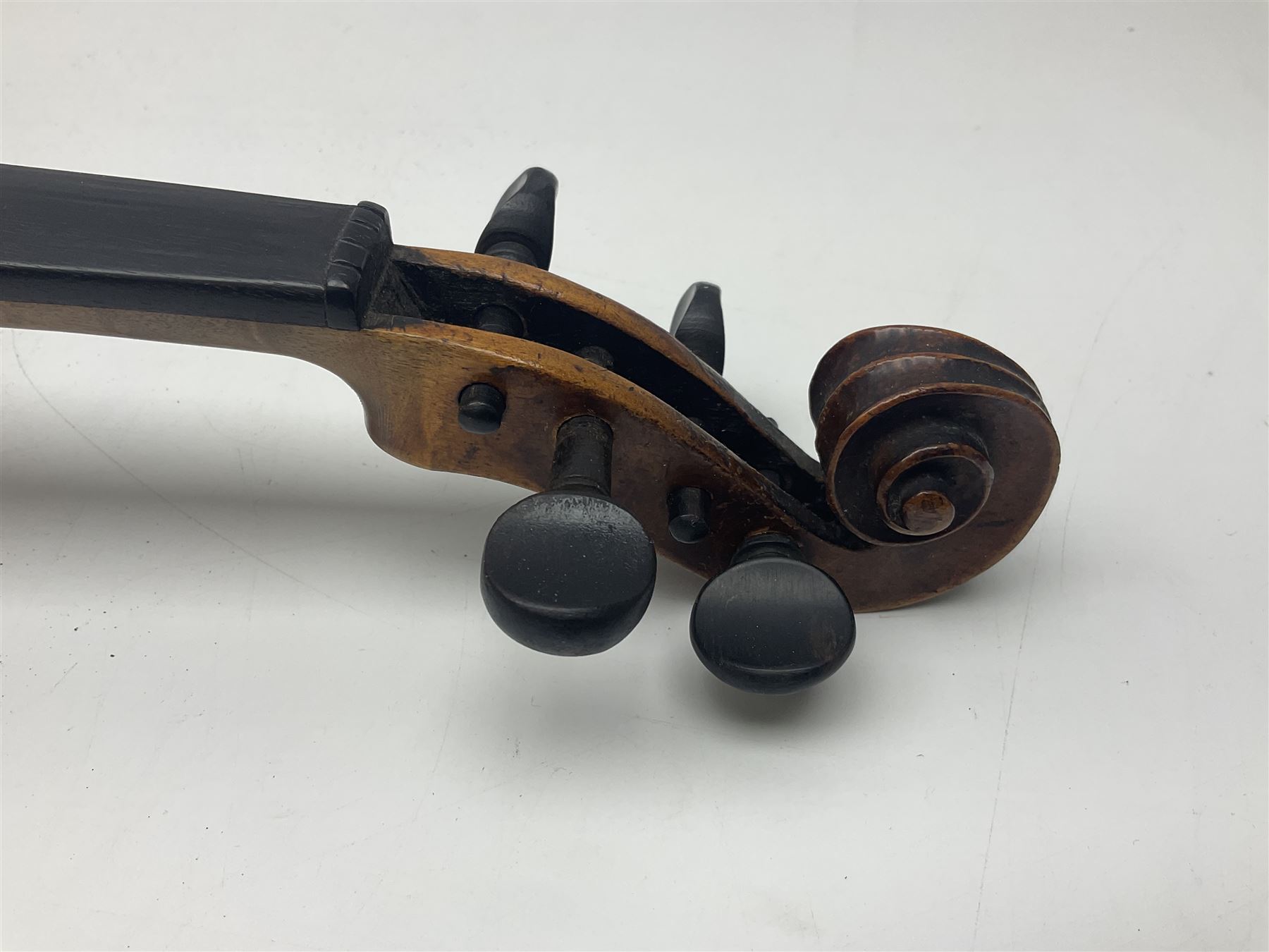 Late 19th century German trade violin c1890 with 36cm two-piece birds-eye maple back, neck and ribs and spruce top; bears label 'Manufactured in Berlin Special Copy of Nicolaus Amati' L59.5cm; in carrying case
