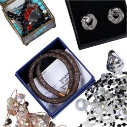 Collection of boxed Swarovski crystal jewellery, including statement necklaces, rings, bracelets and earrings, and a collection of costume jewellery including beaded necklaces