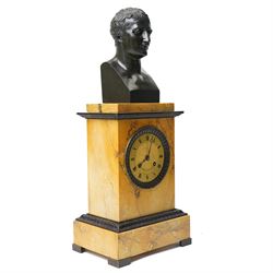 French-First quarter 19th century 8-day sienna marble and bronze-mounted mantel clock of rectangular architectural form, with patinated foliate guilloche pattern cast bronze mounts  in richly figured sienna marble, surmounted a by a classical patinated bronze bust of Napoleon Bonaparte, above a gilt engine turned dial with Roman numerals and blued steel hands, with a twin train Parisian countwheel striking movement, striking the hours and half-hours on a bell, silk suspension with thumb-screw adjustment. With pendulum.