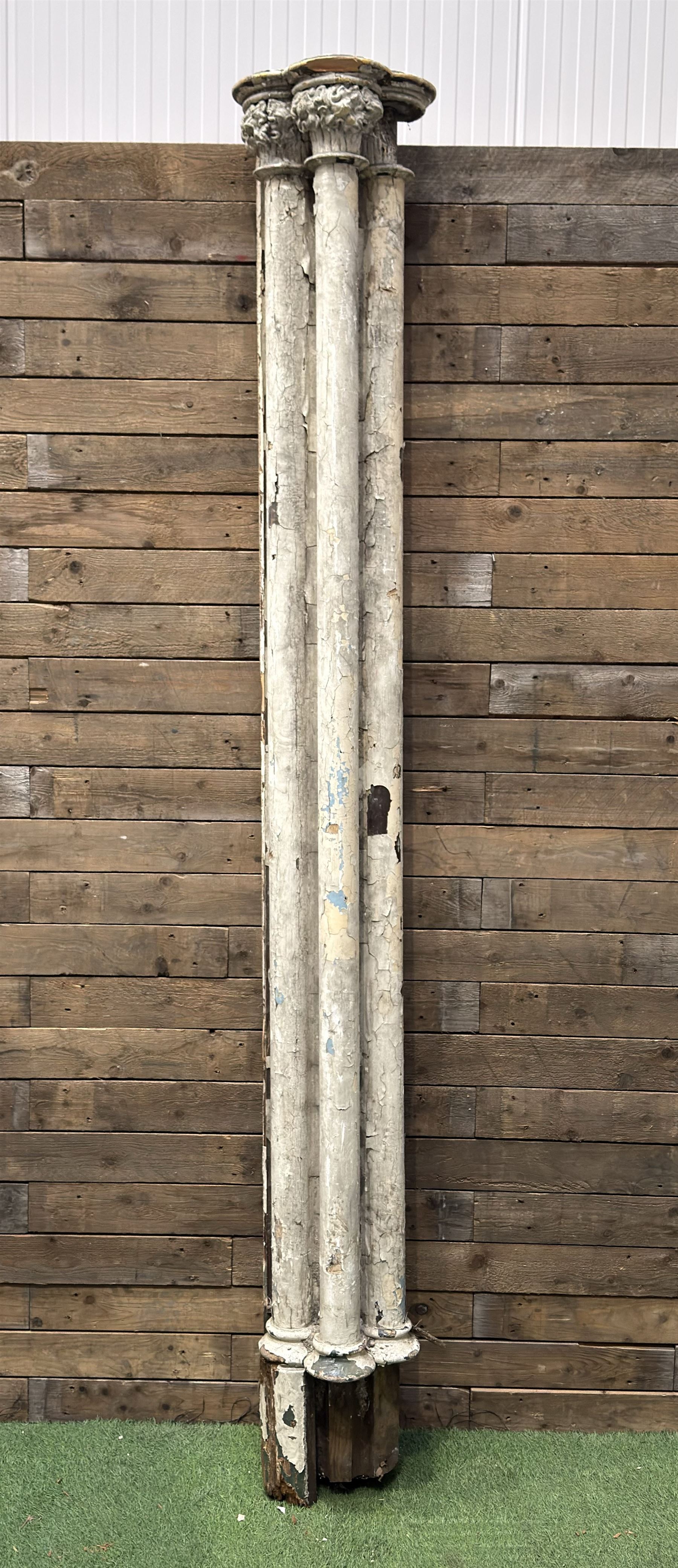 Large 19th century painted pine club shaped column, carved capitals with a cluster of three circular supports, flat back