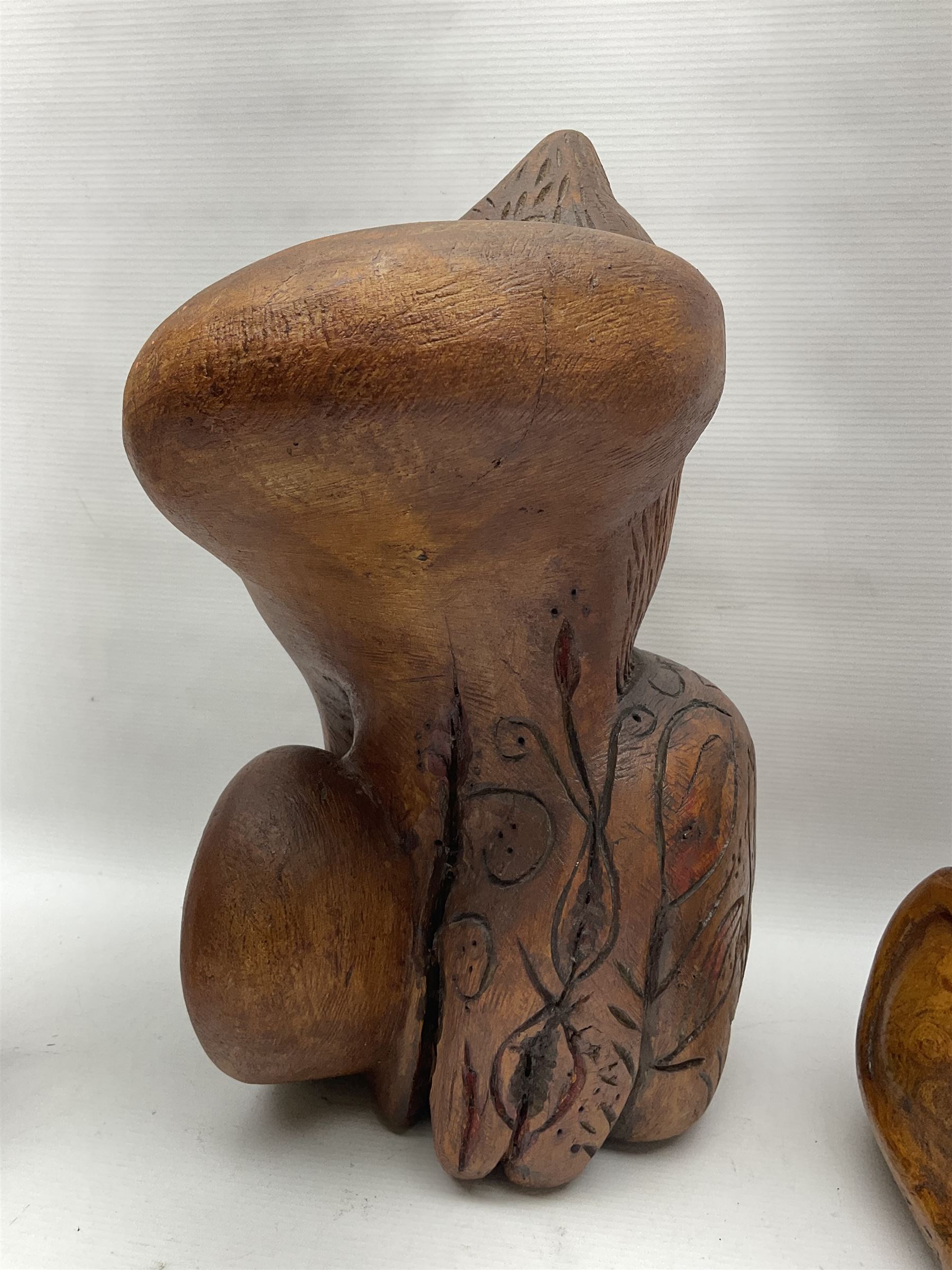 Helen Skelton (British 1933 – 2023): Three carved wooden abstract sculptures, each modelled as a cat, with carved or painted features, largest H63cm. Born into an RAF family in 1933 in Kent and travelled the world extensively during her childhood. After settling in Bridlington, Helen immersed herself in painting, textiles, and wood sculpture, often inspired by nature's beauty. Her talent was showcased in a one-woman show at Sewerby Hall and recognised with the sculpture prize at Ferens Art Gallery in 2000. Sadly, Helen’s daughter passed away from cancer in 2005. This loss inspired Helen to donate her sculptures to Marie Curie upon her passing in 2023.