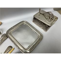Quantity of silver-plate metalware to include butter dish with foliate engraved decoration, J.B. Chatterley & Sons cruet of tapering form with blue glass lined salt, Mappin & Webb, twin branch candelabra and flower bowl centrepiece, cutlery, etc