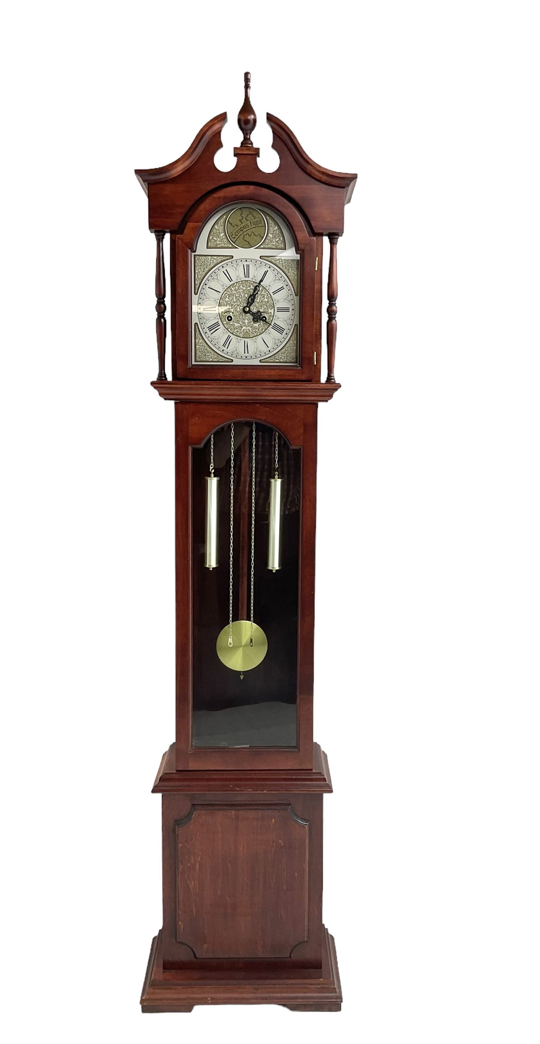 Late 20th century - Mahogany cased spring driven longcase clock, with an etched brass and silvered dial and pierced steel hands, fully glazed trunk door with visible pendulum and dummy weights, striking the hours and half hours on a gong.