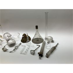 Collection of 19th century and later pharmaceutical laboratory glass, to include, volumetric flasks of various sizes, conical flask, stratus flask, etc (25) Provenance: discovered in the storeroom of a long established Hull pharmacist and opticians