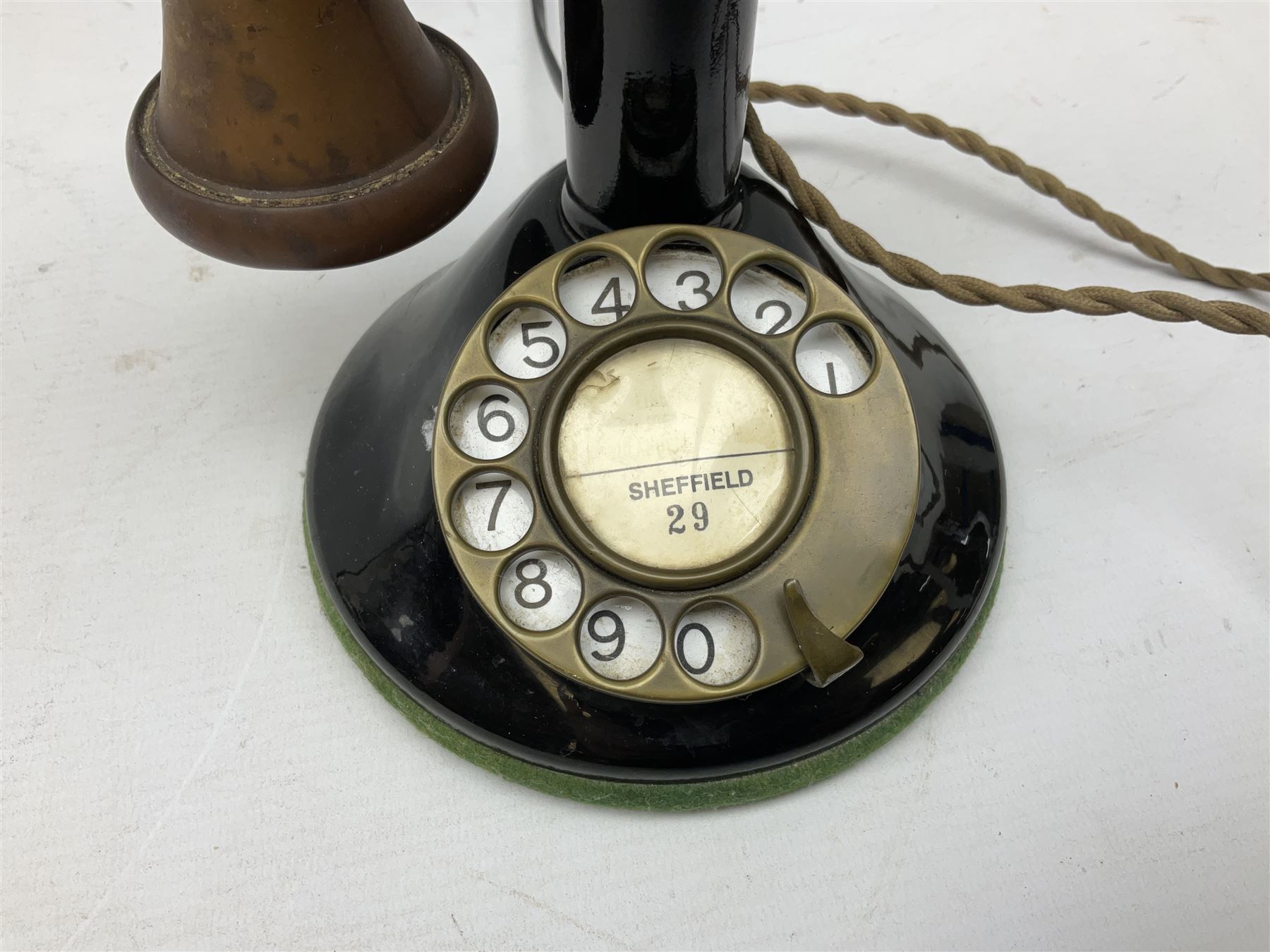 Early 20th century Danish wind up pillar telephone, together with a candlestick telephone with brass dial, wind up telephone H33cm 