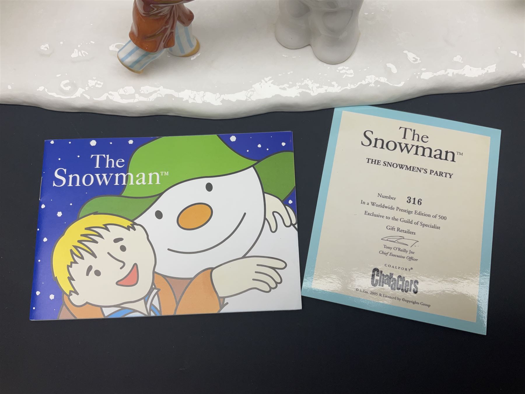 Coalport Characters The Snowman; The Snowman's Party, modeled as the party scene from the snowman, limited edition 316 of 500, with certificate and original box, H16cm L47cm   