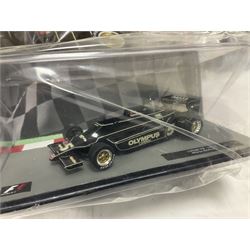 Panini Formula 1 The Car Collection - twelve die-cast models including ten in unopened packaging with periodical; all models in plastic display boxes; and eight other boxed die-cast models of racing cars by Corgi, Onyx, Classico, Minichamps etc (20)
